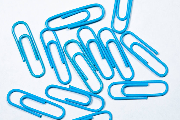 blue office paper clips isolated on white - Photo, Image