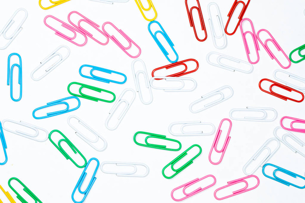 Colored office paper clips isolated on white - Photo, Image