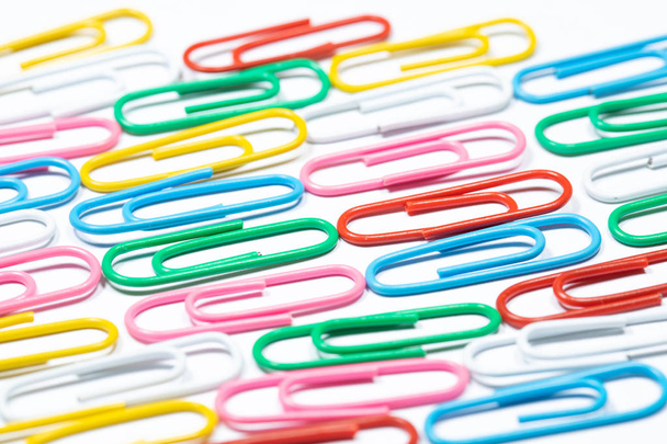 Colored office paper clips isolated on white - Photo, Image