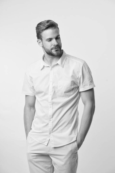 Casual style. Man on calm face posing confidently put hands pockets. Man attractive in casual shirt. Guy fashion model wear casual shirt. Feel comfortable in simple outfit. Casual comfortable outfit - Foto, Imagem