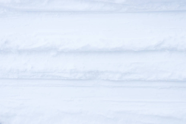 Ski track traces on the snow background. Winter snowy texture. Fresh frozen backdrop. - Foto, afbeelding