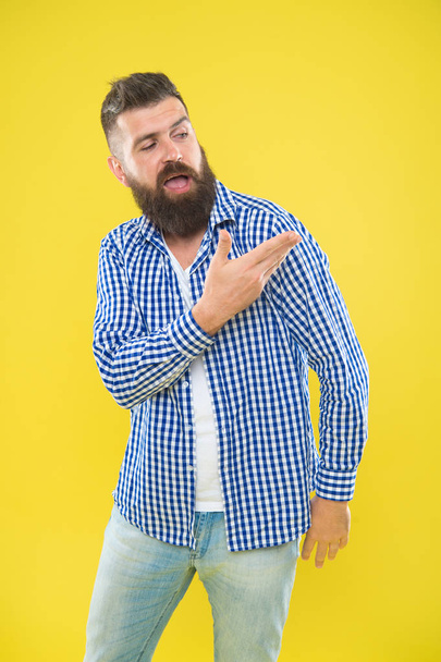 Angel on my shoulder. Beard fashion and barber concept. Man bearded hipster beard yellow background. Barber tips maintain beard. Beard mustache care. Hipster appearance. Emotional expression - Photo, Image