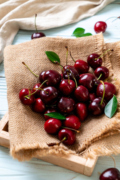 Fresh cherries in bowl  - Fotó, kép