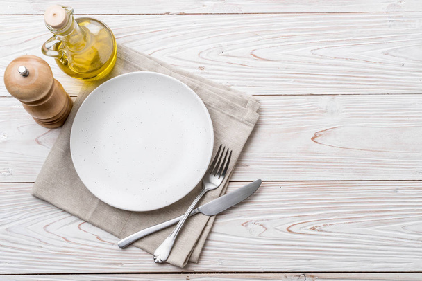 empty plate spoon fork and knife - Zdjęcie, obraz