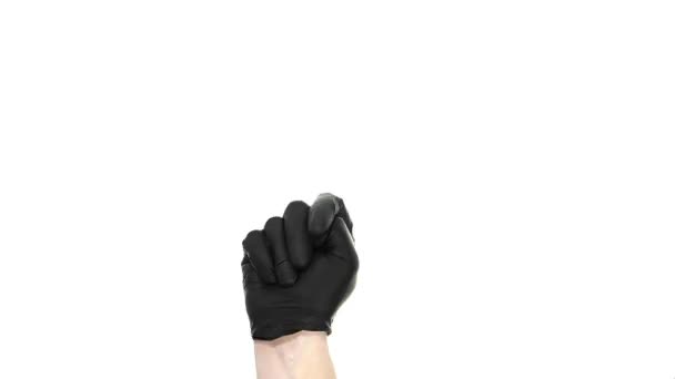 Mužské ruky v černé gumové rukavici na bílém pozadí, ukazuje 5 prsty a pak podobně. - Záběry, video