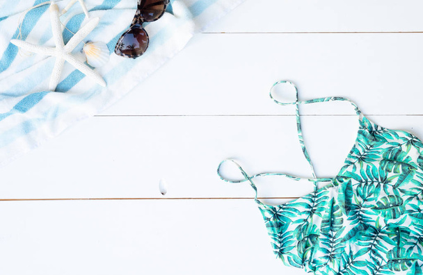 Summer flat lay scenery with swimsuit - 写真・画像