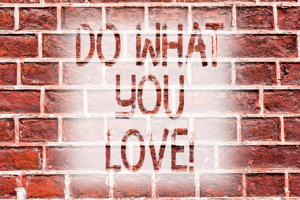 Handwriting text writing Do What You Love. Concept meaning Positive Desire Happiness Interest Pleasure Happy Choice Brick Wall art like Graffiti motivational call written on the wall. - Photo, Image