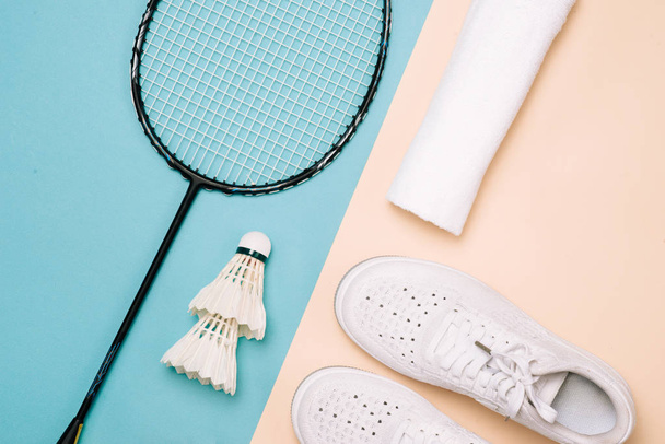 Different sports equipment on pastel color surface - 写真・画像