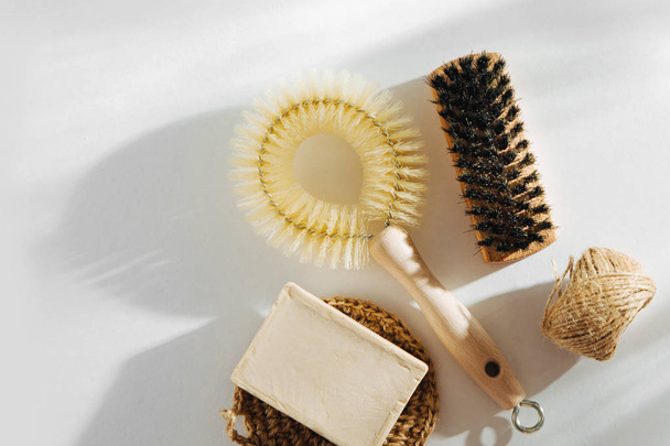 Natural dish brush and cleaning tools with Soap. Zero waste concept. Plastic free. Flat lay, top view  - Foto, Bild