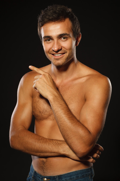 Young smiling muscular male - Photo, Image