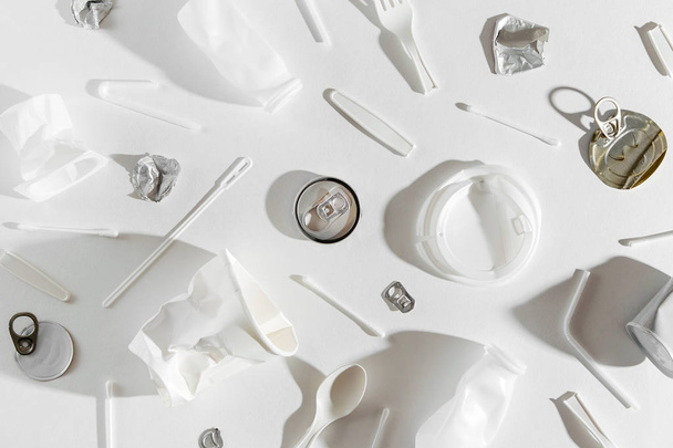 Food  plastic packaging  on  white background. Concept of Recycling plastic and ecology. Flat lay, top view - 写真・画像