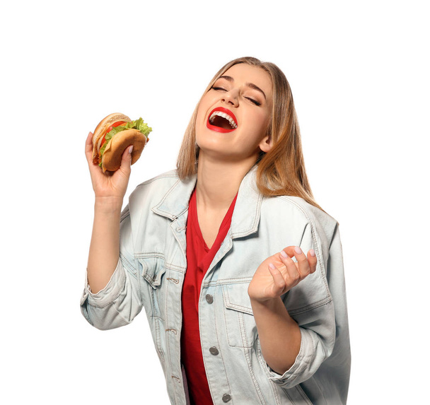 hübsche Frau mit leckerem Burger isoliert auf weiß - Foto, Bild