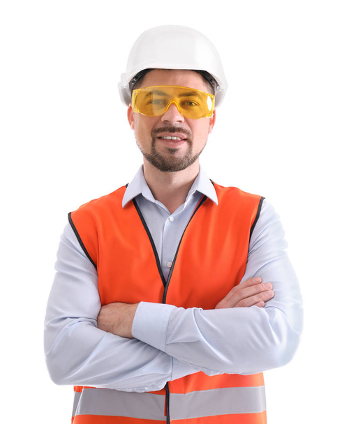 Male industrial engineer in uniform on white background. Safety equipment - Фото, изображение