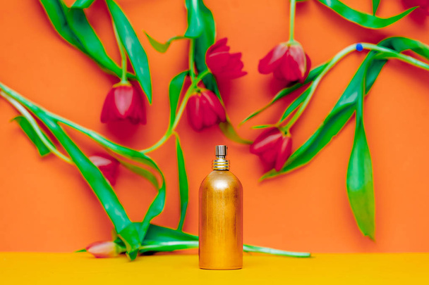 Perfume bottle and tulips - Zdjęcie, obraz