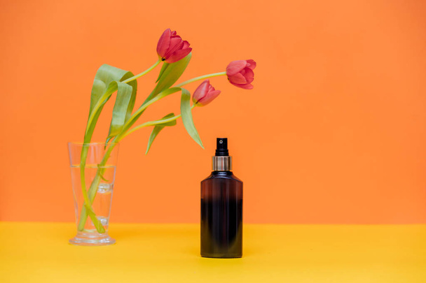 tulips and perfume bottle  - Photo, Image