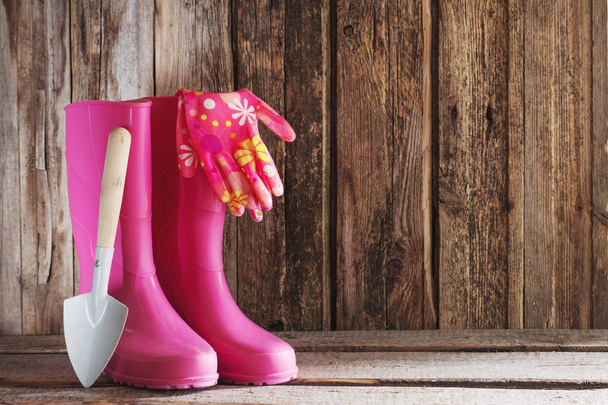 rubber boots wooden background - Foto, immagini