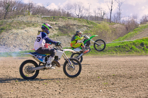 competition between two motocross bikes, side view - Photo, Image