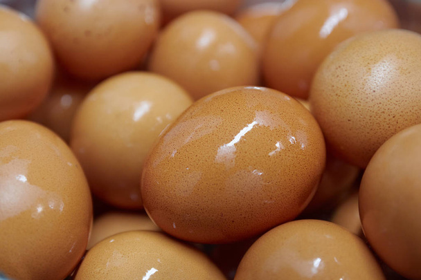 background of yellow chicken eggs. yellow eggs closeup. macro photography. - Photo, image