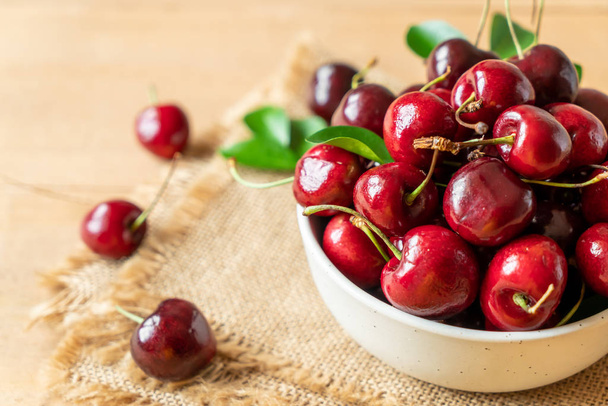 Fresh cherries in bowl  - Fotó, kép