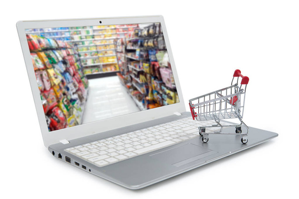 internet online alışveriş kavramı ile bilgisayar ve sepeti - Fotoğraf, Görsel