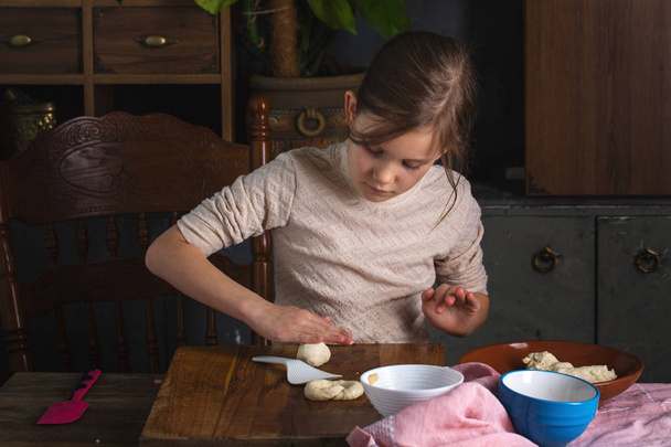 Girl rolls the dough - Photo, Image