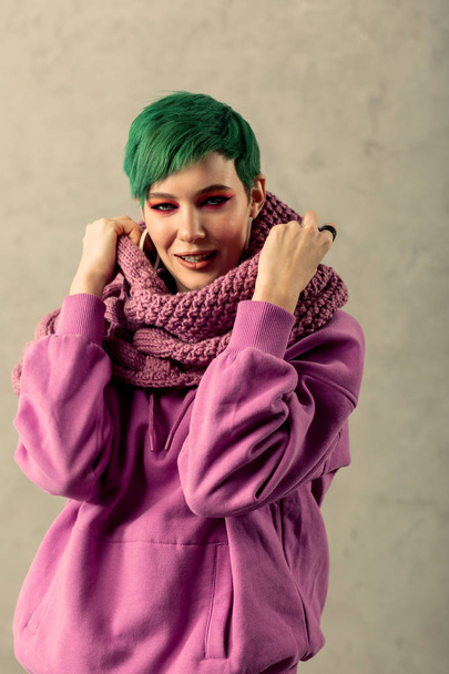 Nice attractive young woman wearing warm clothes - Valokuva, kuva
