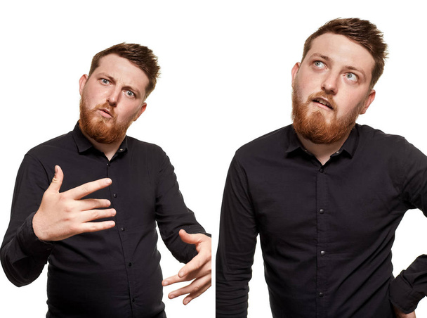 Brutal, attractive, bearded man poses in a black shirt, isolated on a white background - Photo, Image