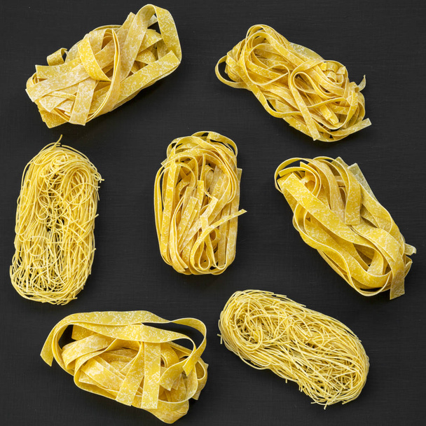 Set of various uncooked pasta(fettuccine, pappardelle, tagliolin - Photo, Image