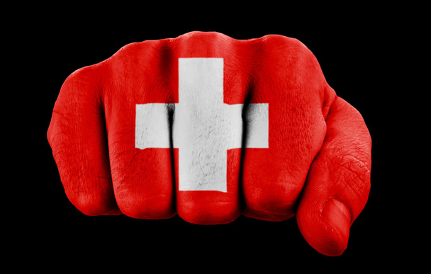 İsviçre bayrağı ile yumruk - Fotoğraf, Görsel