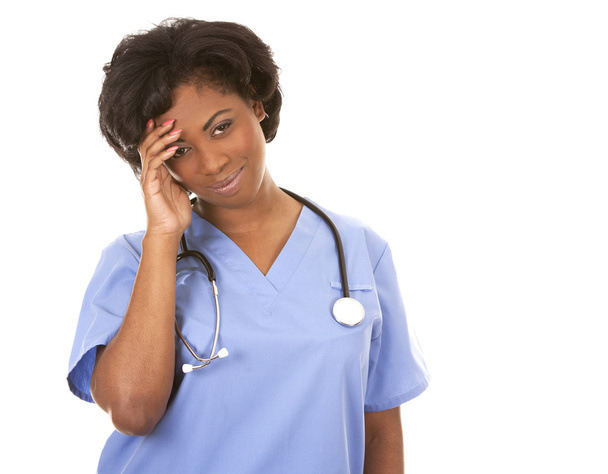nurse having a headache - Foto, immagini