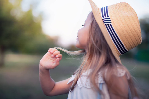 Summer outdoor portrait of beautiful happy child - Фото, изображение