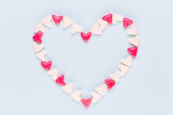 Valentines day background pastel hearts on blue wooden backgroun - Photo, Image