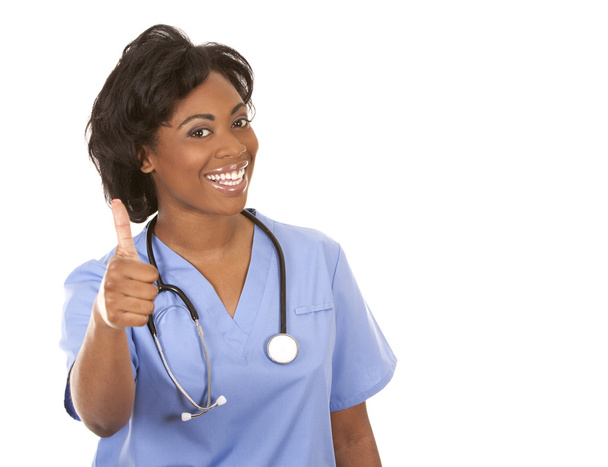 nurse giving thumbs up - Foto, afbeelding
