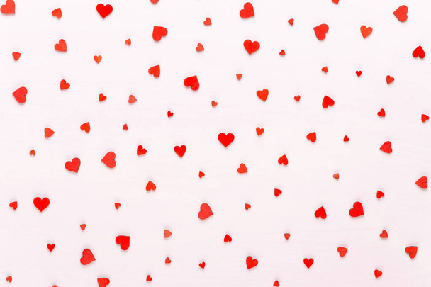 Happy Valentines day background. With small color hearts on gray - Foto, immagini
