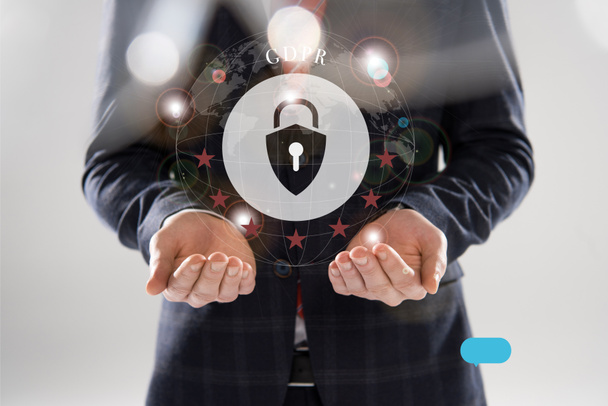 cropped view of businessman in suit with outstretched hands and gdpr letters and lock illustration in front  - Photo, Image