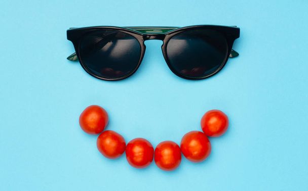 Creative summer minimal background with sunglasses. Flat lay con - Foto, imagen
