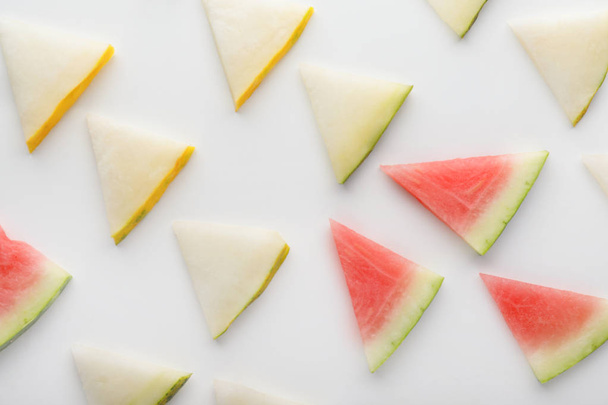 Slices of melon and watermelon on white background - Photo, Image