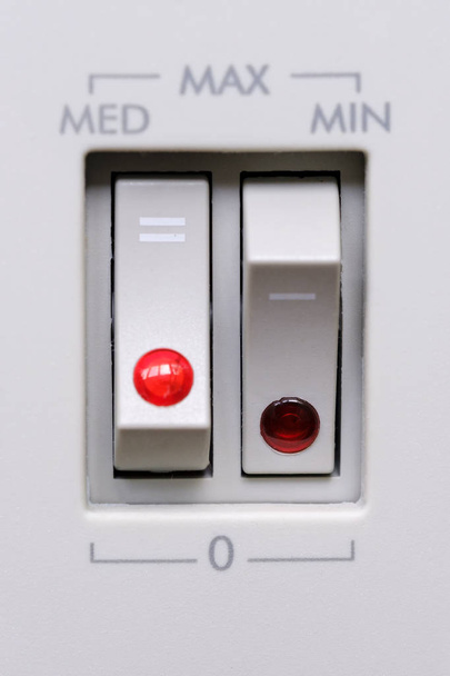 Les interrupteurs d'alimentation du chauffage électrique
 - Photo, image