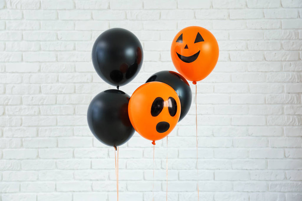 Color balloons for Halloween party on light background - Zdjęcie, obraz