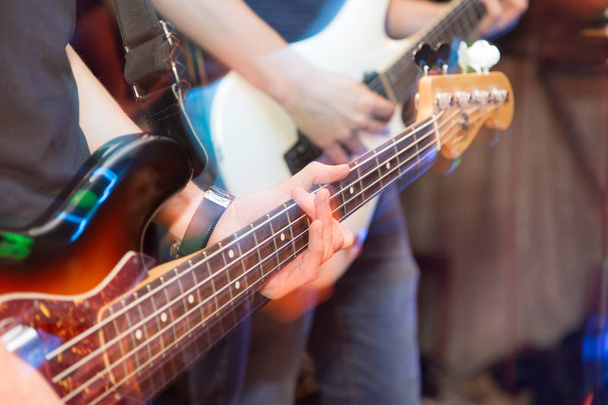 aggressive play guitar on stage - Foto, Bild