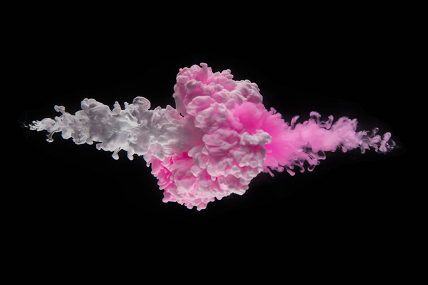 Coloured acrylic ink mixing in water on black - Zdjęcie, obraz