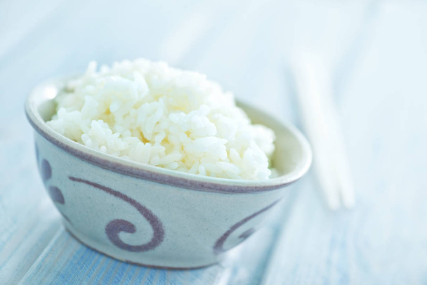 boiled rice in bowl and on a table - Foto, Imagem