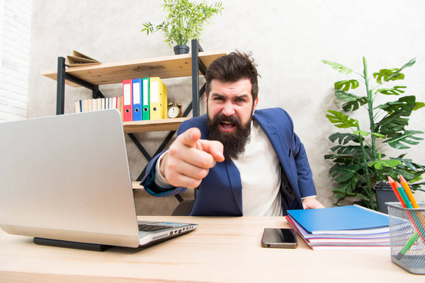 Angry boss. feeling so angry. Angry businessman. Furious mature man pointing finger on you. Blaming each other. Brutal businessman in office. Mature bearded hipster use computer. Male boss working - Foto, Imagen