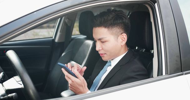 man use phone in car - Fotó, kép