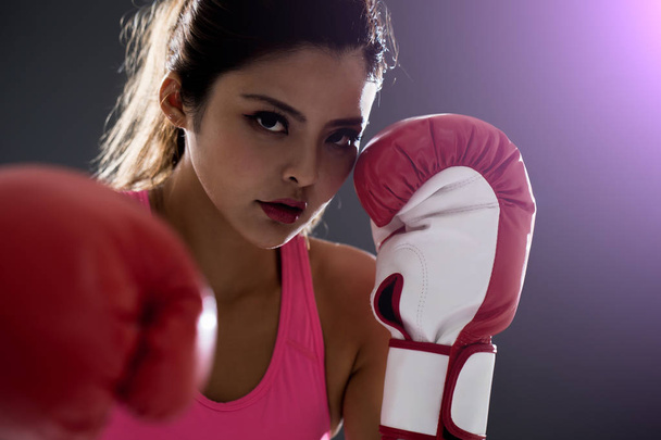 woman posing in boxing gloves - 写真・画像