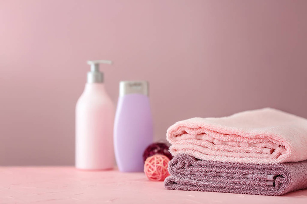 Stack of clean soft towels on table - Fotó, kép