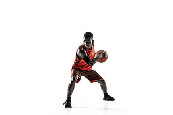 Full length portrait of a basketball player with ball - Zdjęcie, obraz