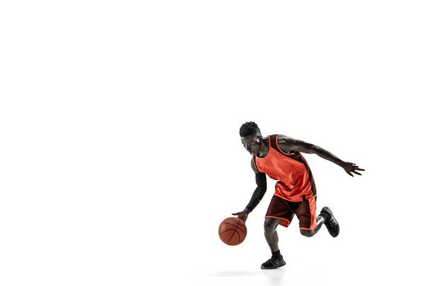 Full length portrait of a basketball player with ball - Foto, Imagen