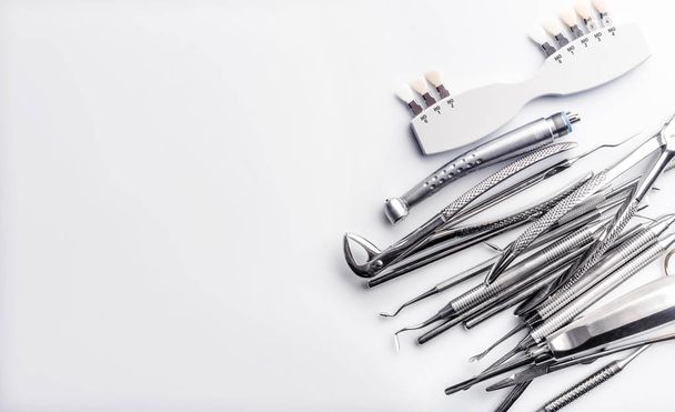 Dental tools on white table - Фото, зображення