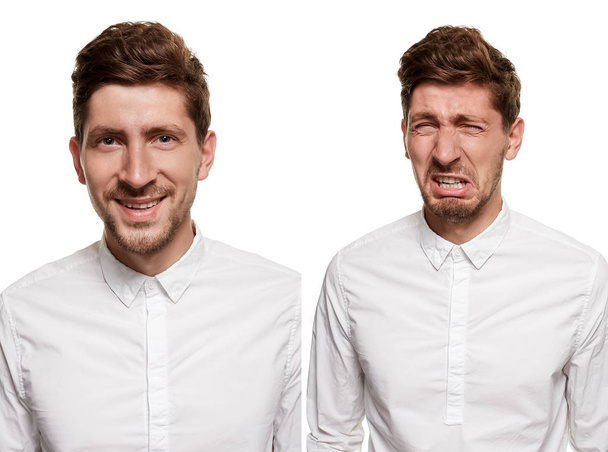 Handsome man in a white shirt makes faces, isolated on a white background - Photo, Image